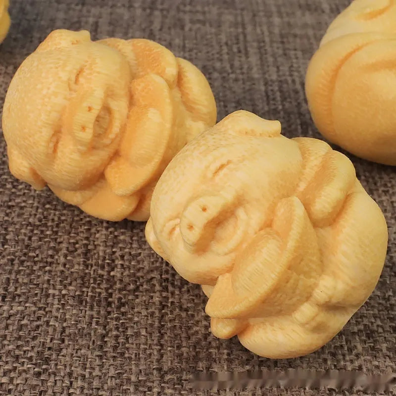 Bamboo pig carving ornament with ingot shape measuring 4cm height and 3.5cm diameter