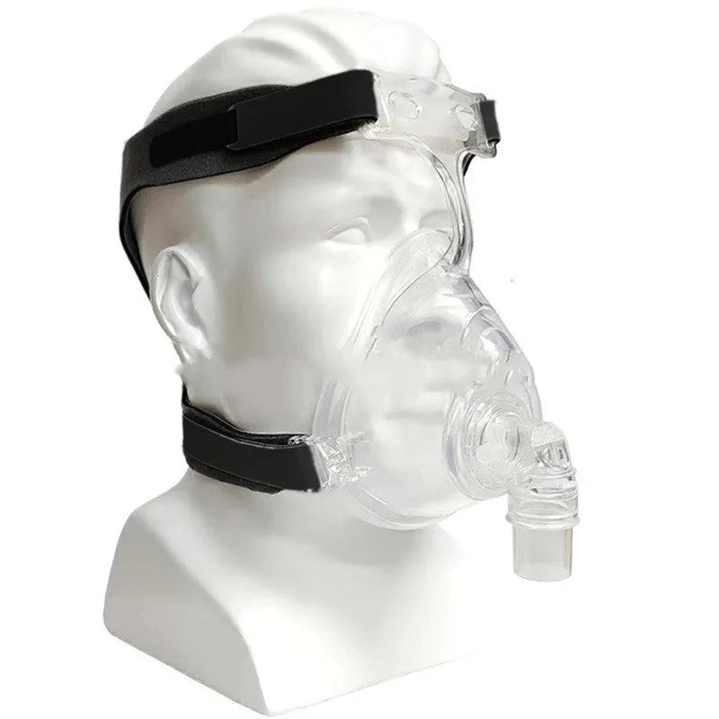 CPAP breathing mask kit with transparent silicone mask, headband, and two PC adapter elbows.