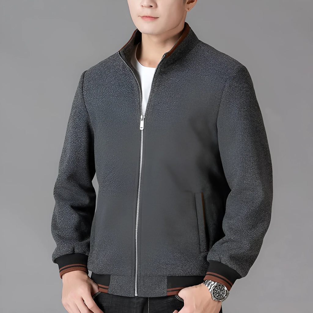 Men's grey polyester fleece autumn jacket with long sleeves and a stick pocket.
