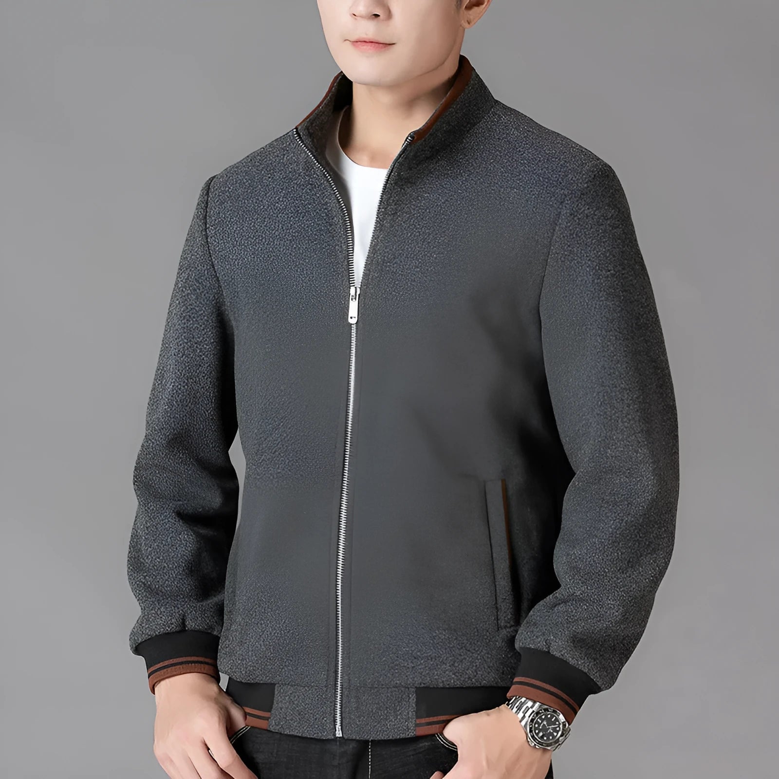 Men's grey polyester fleece autumn jacket with long sleeves and a stick pocket.