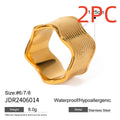 Geometric wide band stainless steel wave ring for women with electroplated finish.