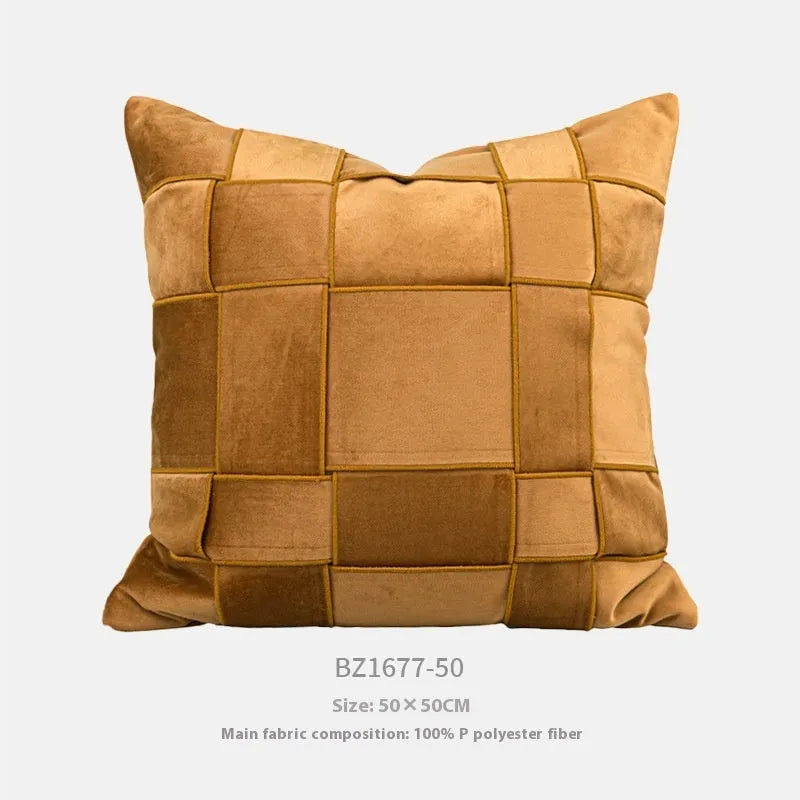 Square woven chenille pillow cushion in beige colour on a grey sofa, 50cm by 50cm size.