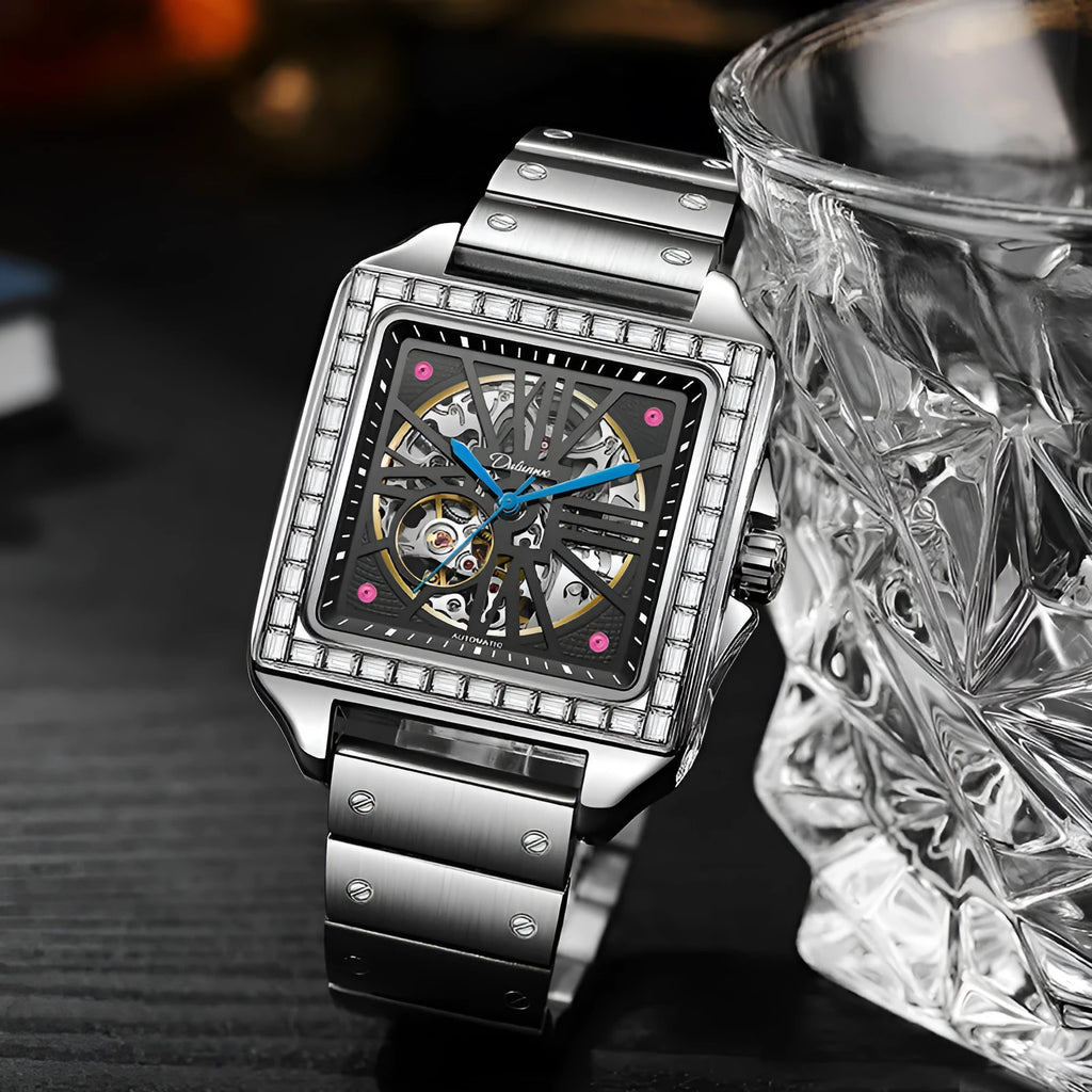 Men's square automatic watch with diamond-studded bezel on a stainless steel belt