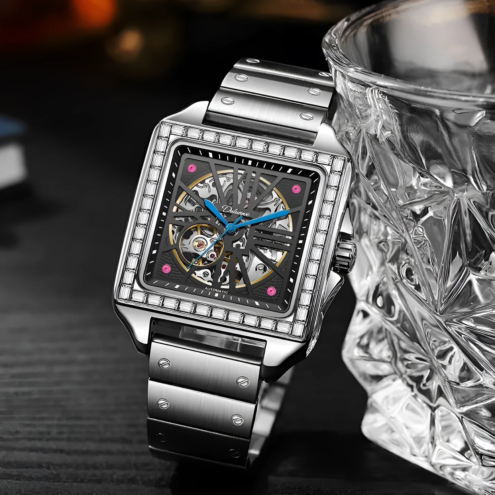 Men's square automatic watch with diamond-studded bezel on a stainless steel belt