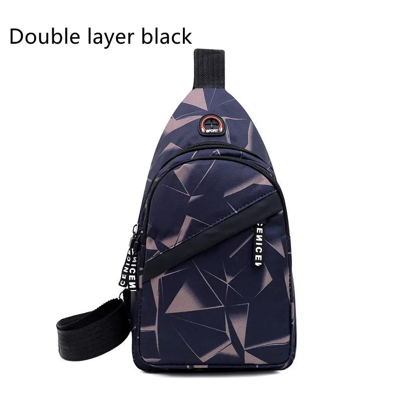 Men's blue Oxford cloth crossbody sling bag showing earphone hole and front zipper.