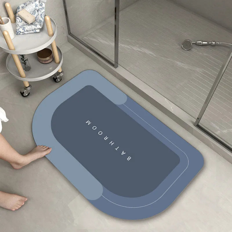 Blended fabric bathroom floor mat in blue, available in oval and rectangular shapes