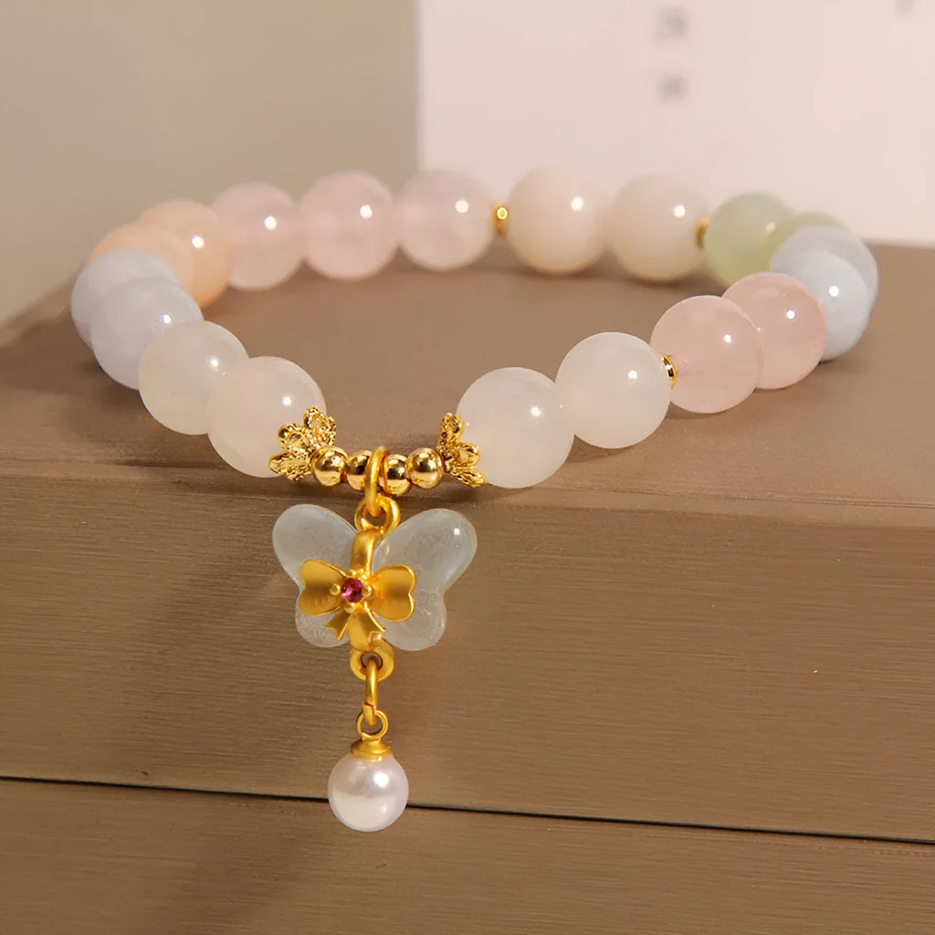 Colourful morganite bracelet with crystal butterfly pendant on silver chain