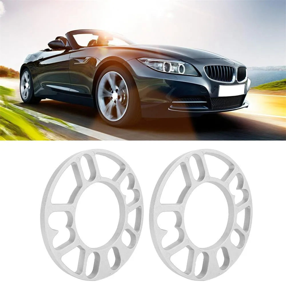A single, circular metal automotive wheel hub spacer gasket for modifying wheel offset and brake clearance.