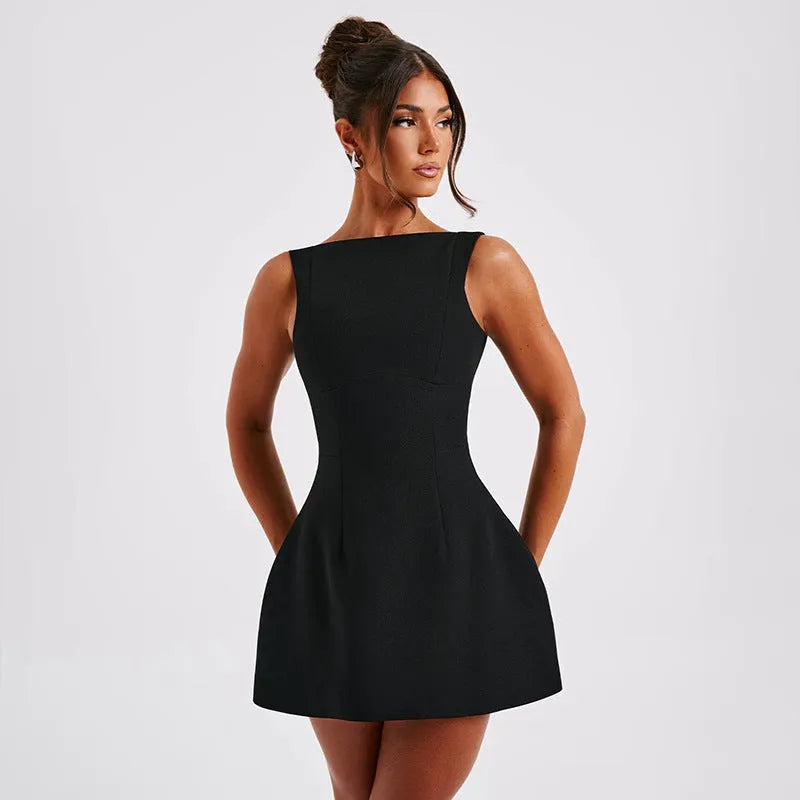 Women's slim-fit backless summer dress with sling straps in a selection of colours.