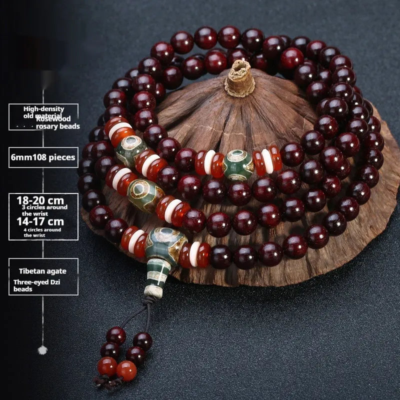 Men's traditional rosewood bracelet with 108 beads, showing lapis lazuli and turquoise accent styles.