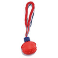 Blue and red durable rubber dog ball with rope attachment toy for medium and small dogs