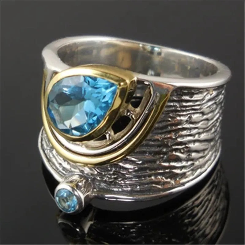 Blue zircon inlaid women's ring with Chinese style design and drop shape on alloy band