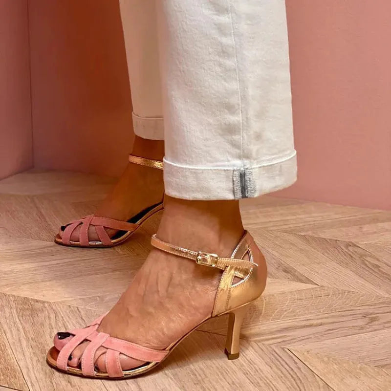 A pair of casual peep toe sandals with a buckle fastening and an over-the-knee sock length.