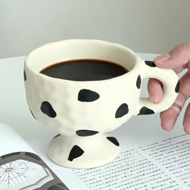 Hand-pinched irregular ceramic mug in solid colour, approximately 250ml capacity