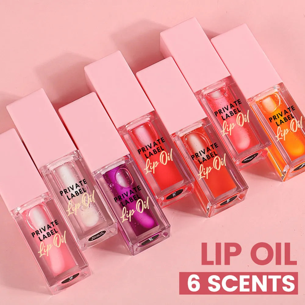 Women's transparent lip gloss set showing six 6ml tubes in bird of paradise, cherry, coral, mango, strawberry and watermelon shades