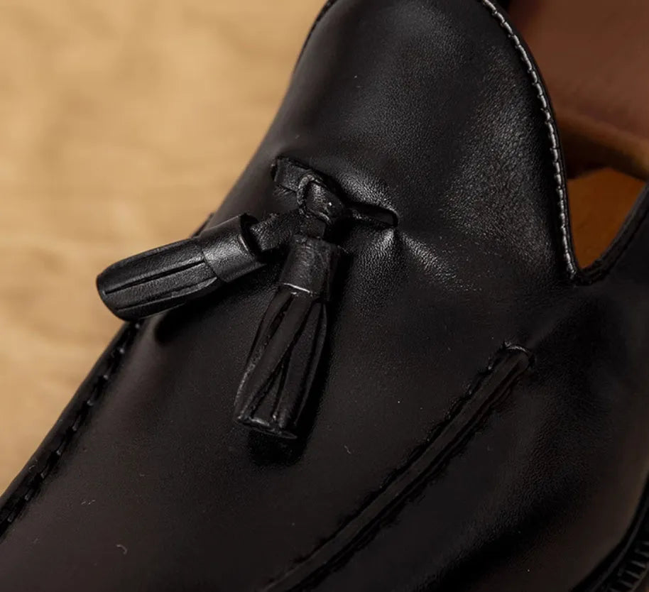 Men's black genuine leather loafers with fringed British styling and slip-on design