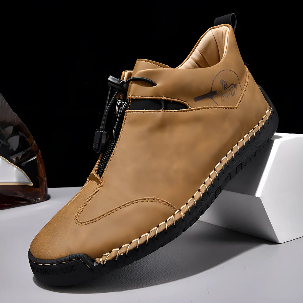 Men's black casual leather shoes with round toe and mid heel on a rubber sole