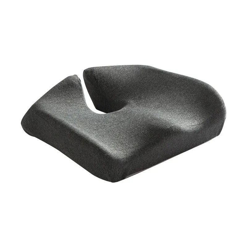 Black memory foam office chair cushion with a solid colour polyester cover, shown on a chair seat.