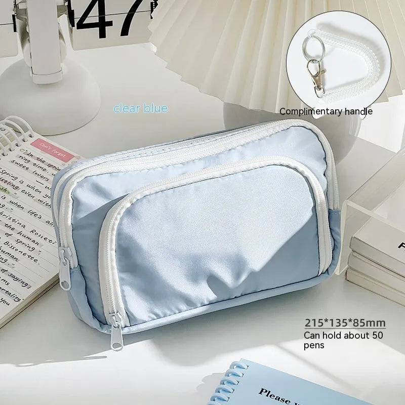 Double layer pencil case in solid colour with two compartments and gift handle for stationery organisation