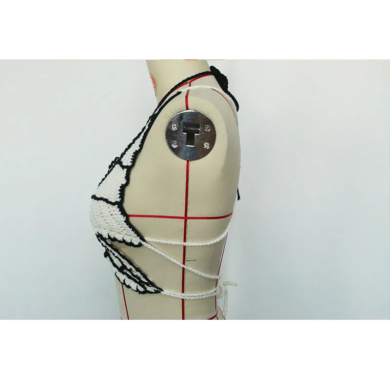 Women's black and white classic style bikini swimsuit made from acrylic fabric.