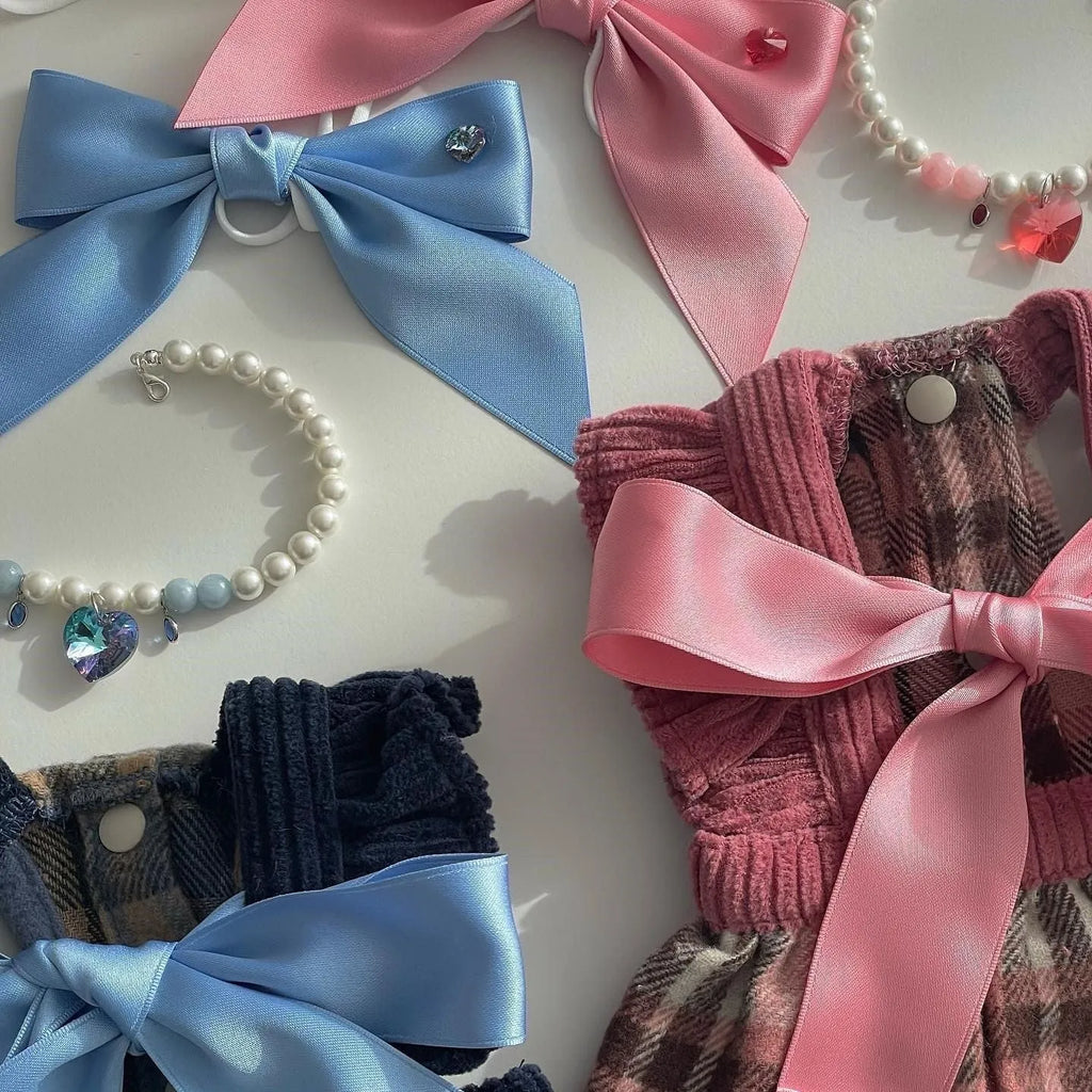 Princess style dog hair band with bow tension adjustment on small dog