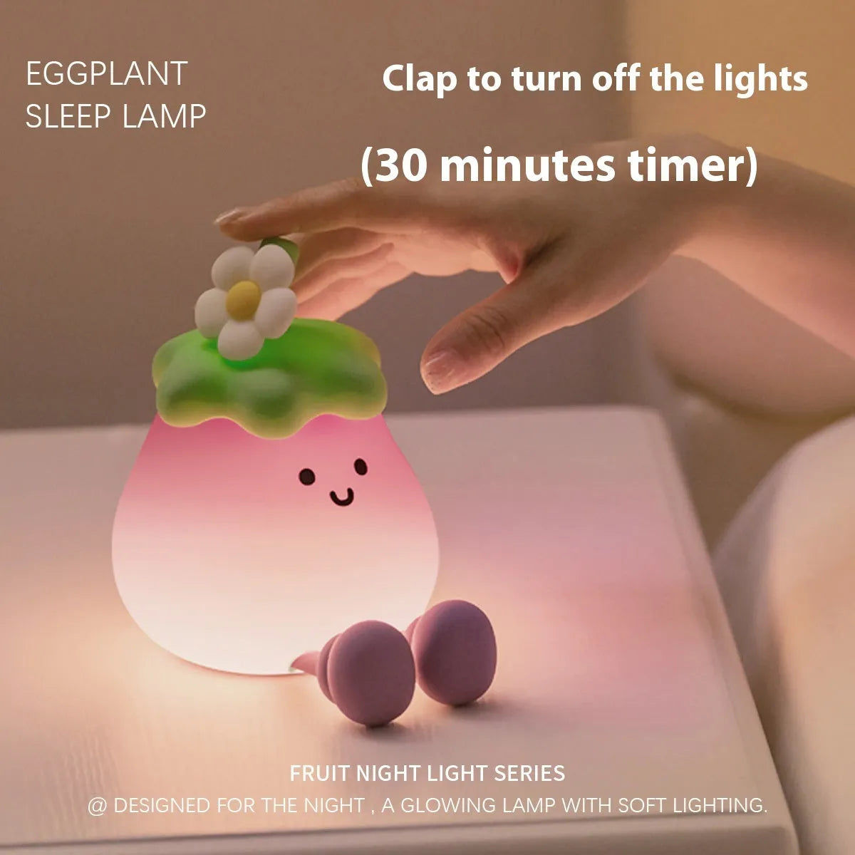 Cartoon eggplant-shaped small night lamp with soft yellow glow, shown next to a broccoli design variant.