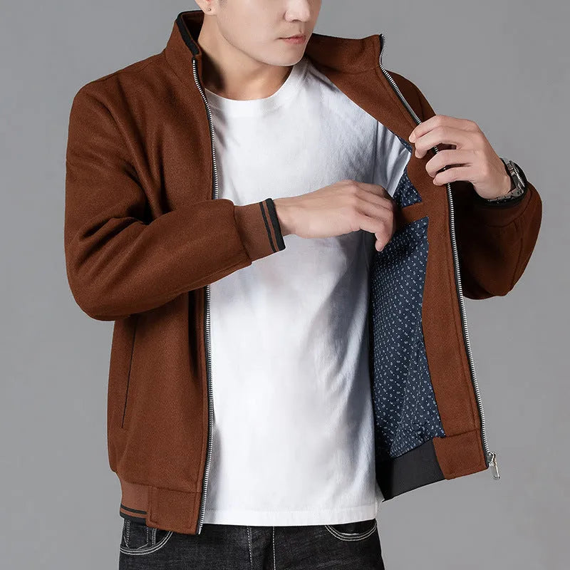 Men's grey polyester fleece autumn jacket with long sleeves and a stick pocket.