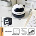 Handheld USB rechargeable desktop vacuum cleaner in a choice of rocket or animal designs on a desk.
