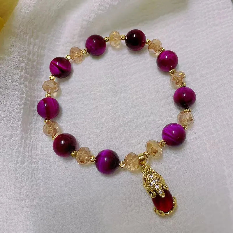 Handmade natural Vanves stone Tigereye bracelet on wrist showing single or double chain with fox motif.
