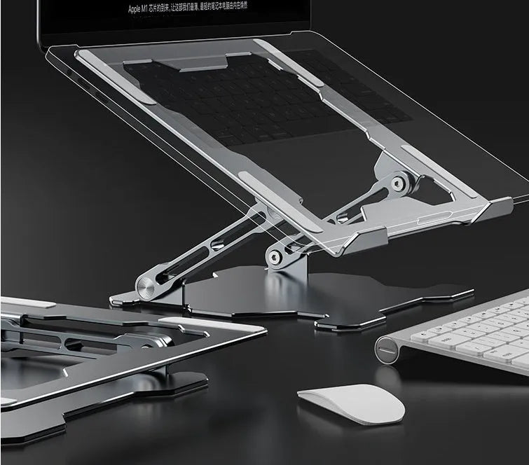 Grey adjustable aluminum laptop stand showing folding mechanism and hollow cooling design