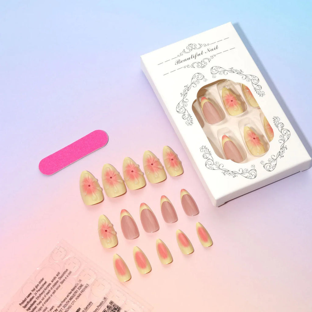 Cartoon 3D flower design on plastic fake nail armour pieces from a detachable nail kit.