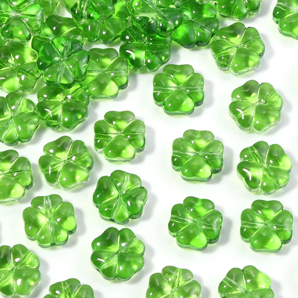 50 glass four-leaf clover beads in assorted colours with coloured glaze finish and 10mm straight hole design.