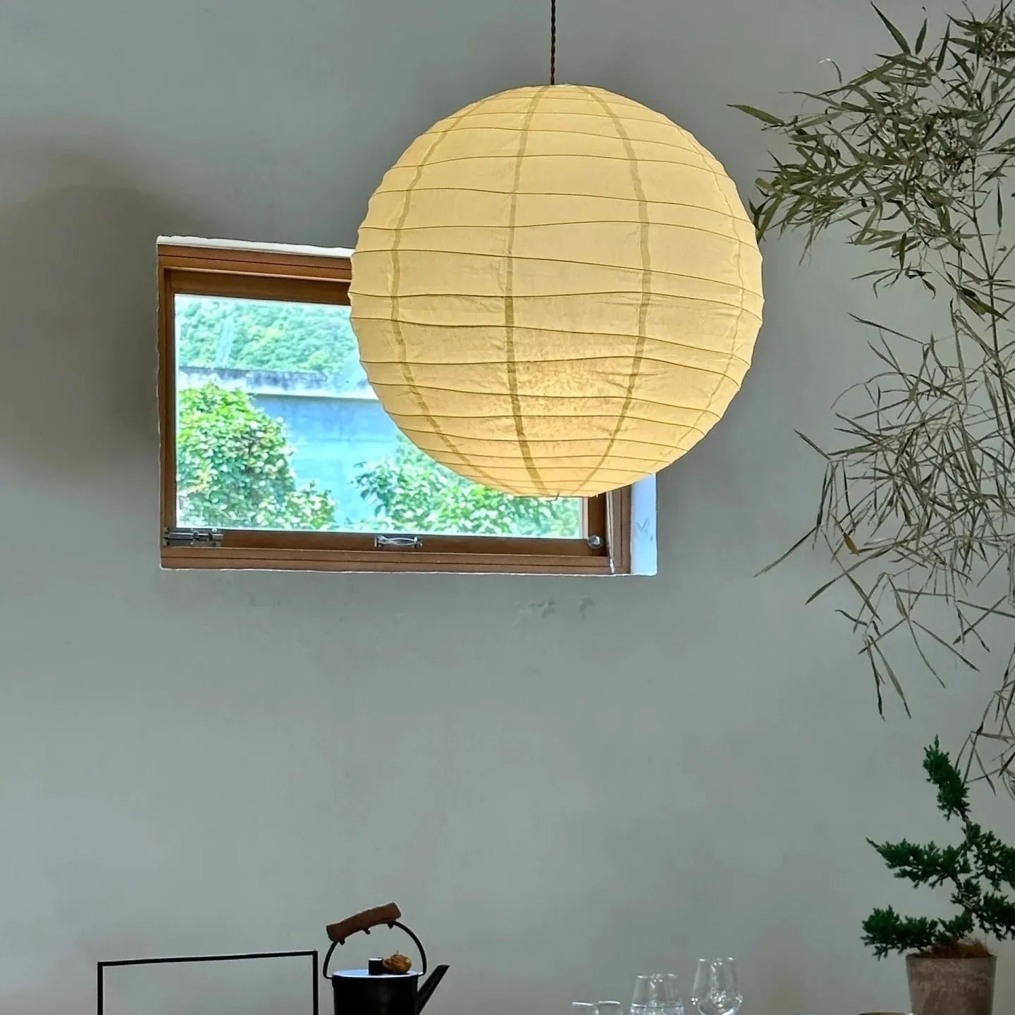 Japanese style rice paper chandelier ceiling light in a living room setting