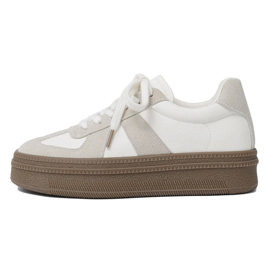Retro round toe casual sports trainers in milky white with cross straps and lace-up front
