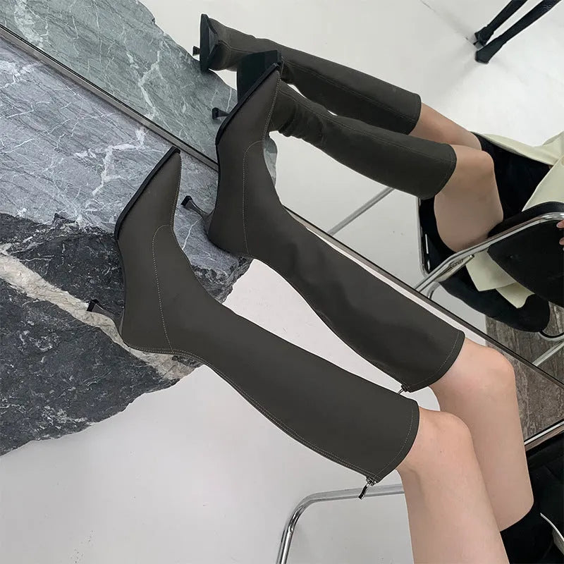 Women's black pointed toe below knee boots with back zipper and stiletto heel