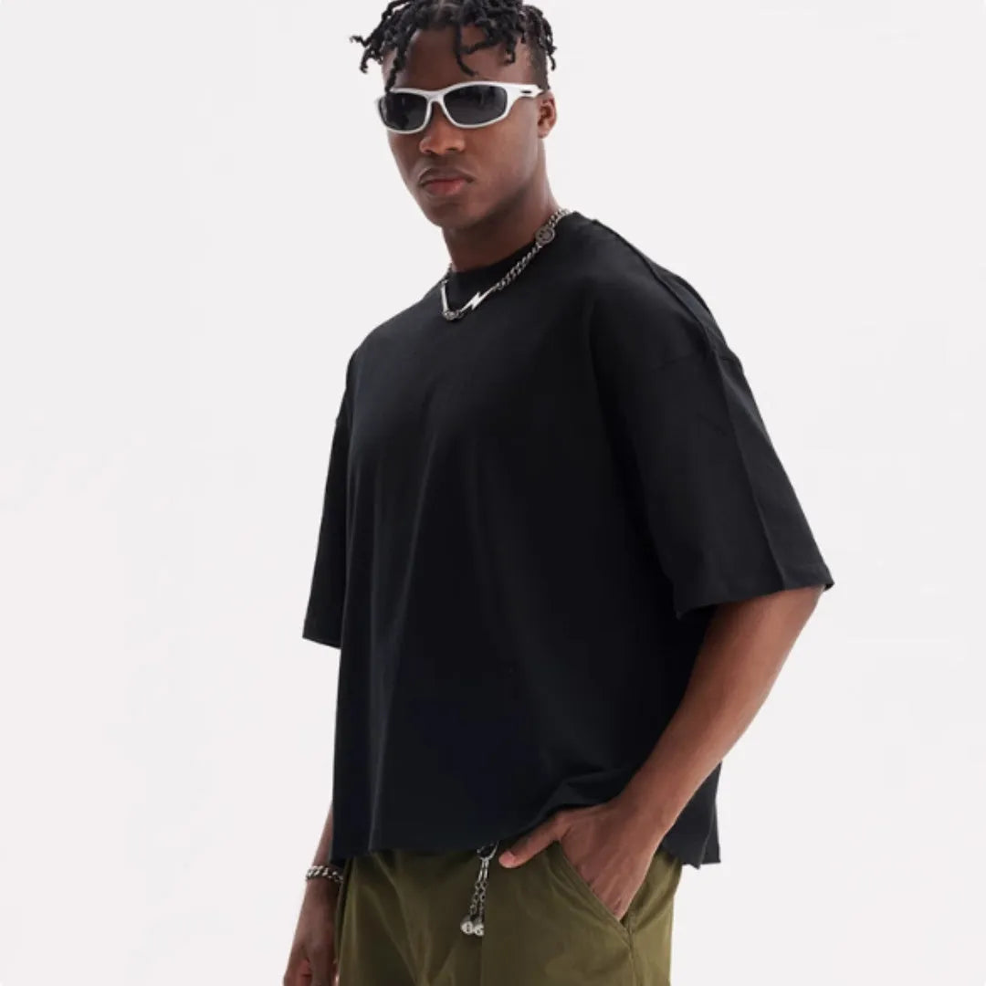 Man wearing a loose-fit apricot coloured pure cotton t-shirt, American style, short sleeves.