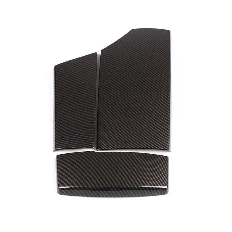 Three black ABS armrest protective covers with carbon fibre pattern for car centre console