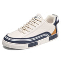 Men's casual canvas shoes with mesh panels in beige, white and green colours, flat heel design