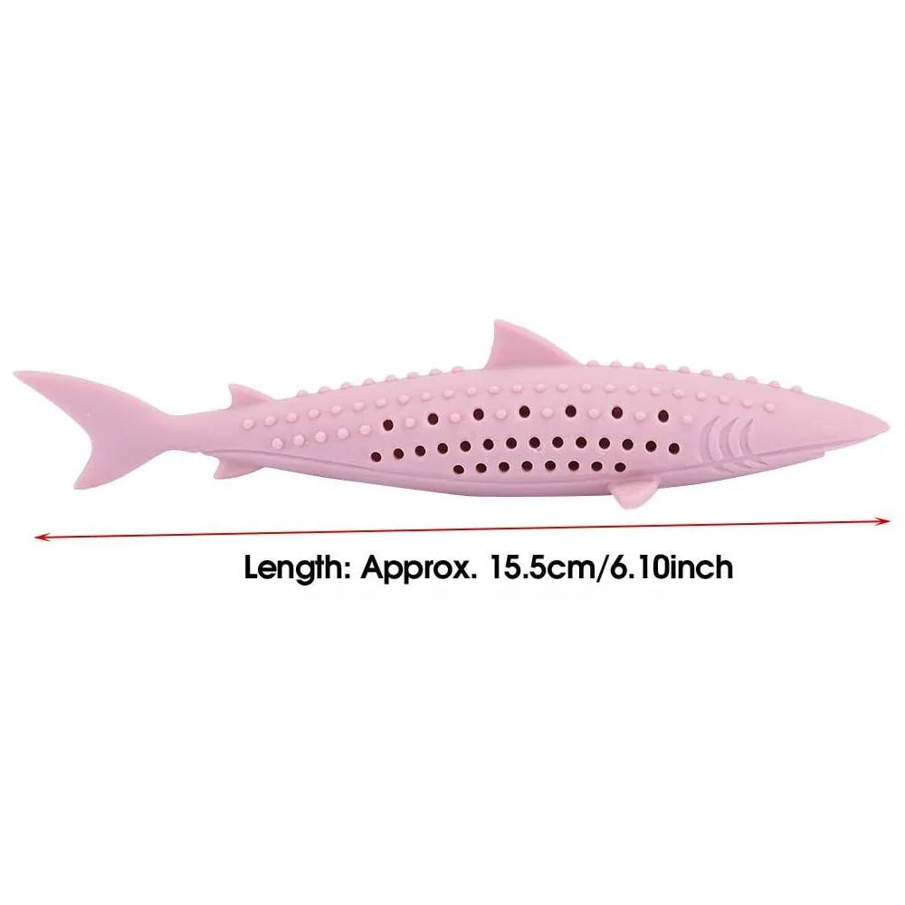 Green silicone fish-shaped chew toy for cats on a white background