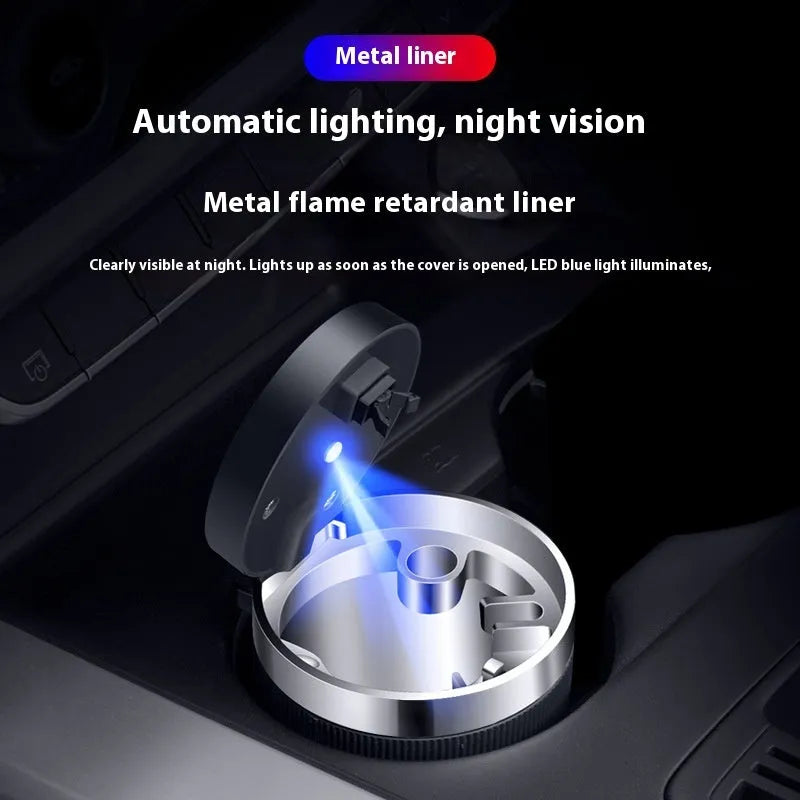 Metal ABS car ashtray with cover and blue LED light against a dark background