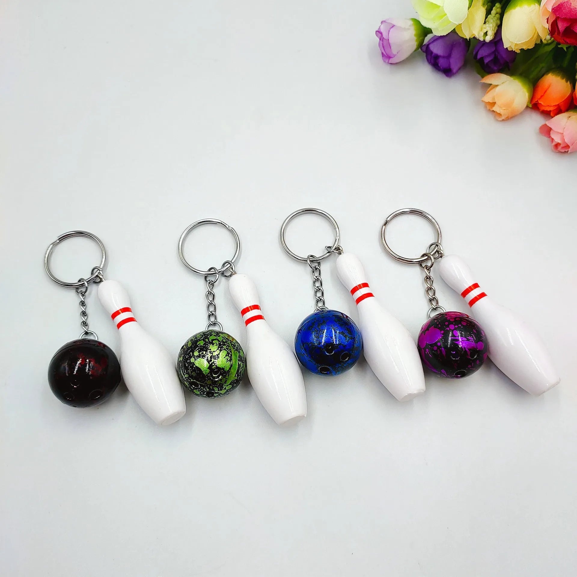 Mini bowling simulation keychain pendant in PVC metal available in four colours