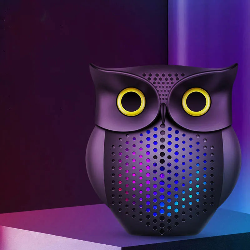 Black cartoon owl wireless Bluetooth speaker showing front design and compact size
