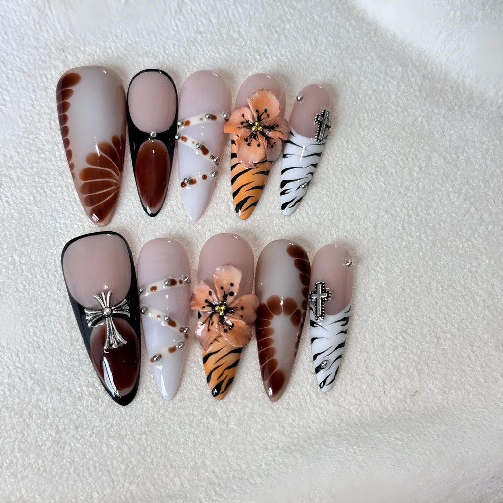 Leopard print press-on nails with cross and flower patterns in four sizes