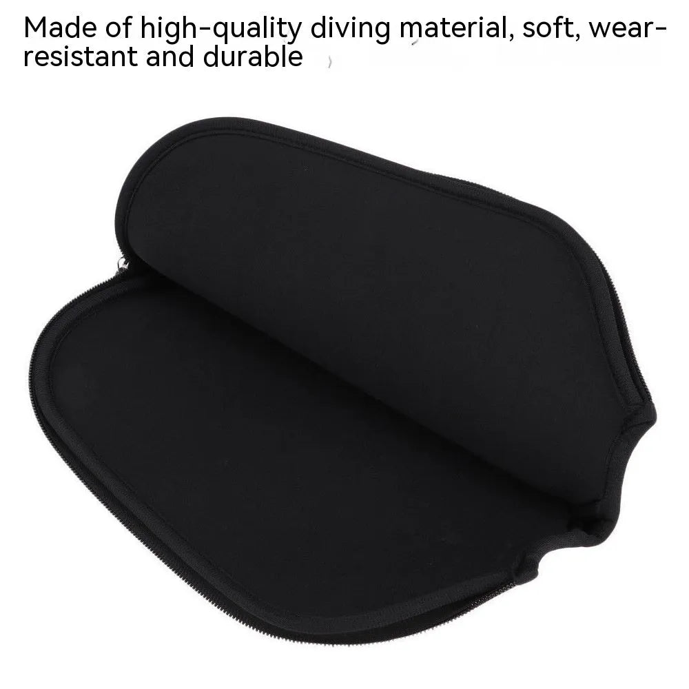 Black neoprene protective sleeve for a table tennis racket on a grey background.