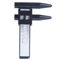 Digital hole distance measuring tool with electronic display, plastic caliper body shown next to a ruler for scale.