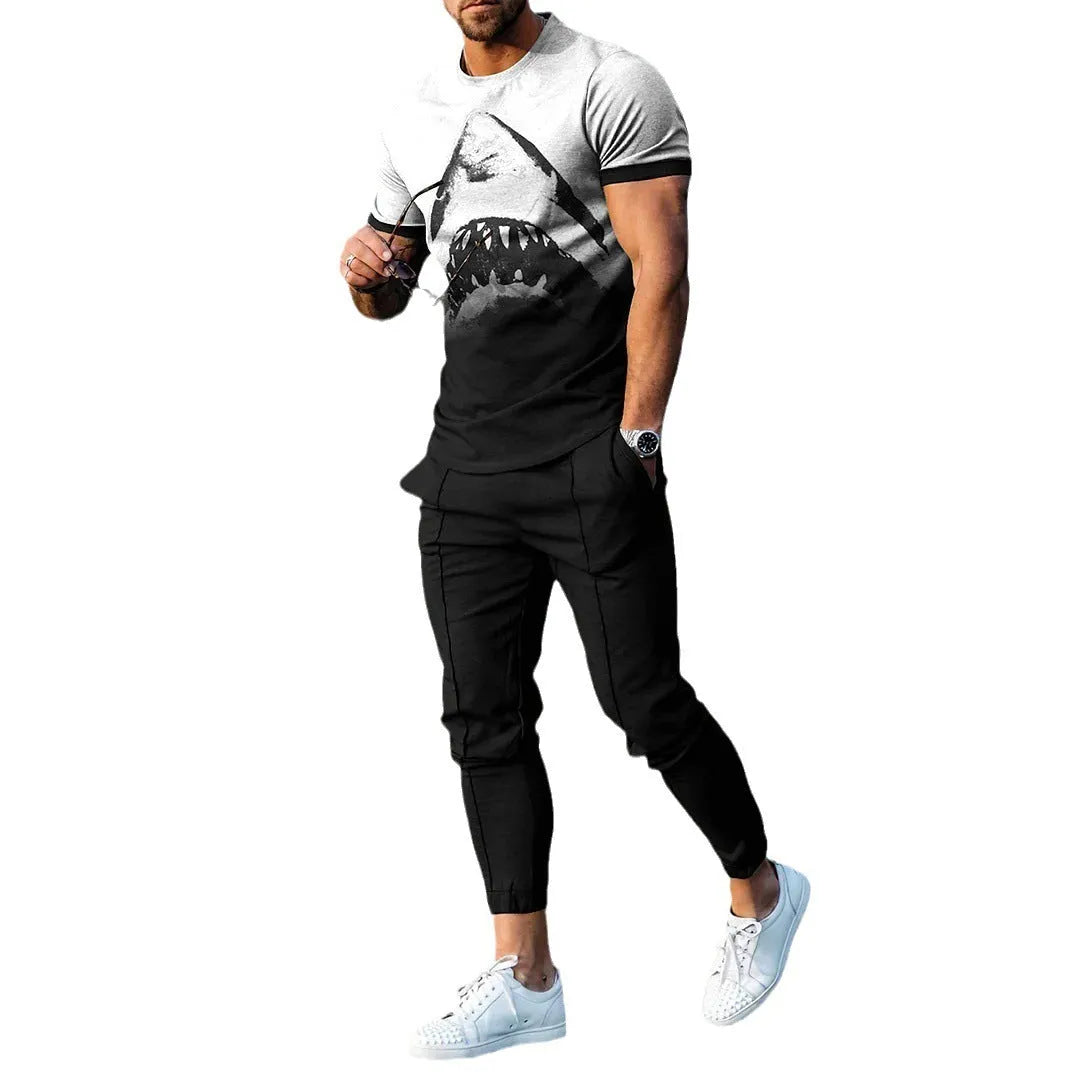 Men's short sleeve round neck T-shirt and matching trousers set in a light grey colour.
