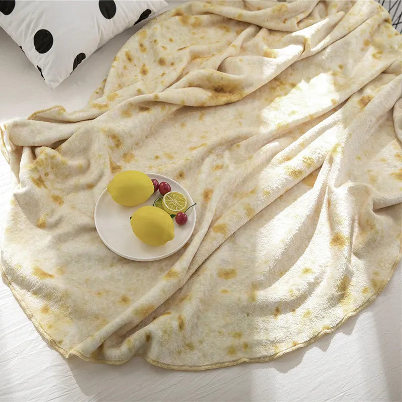Round and rectangular flannel burrito blankets in various sizes with food-themed print.