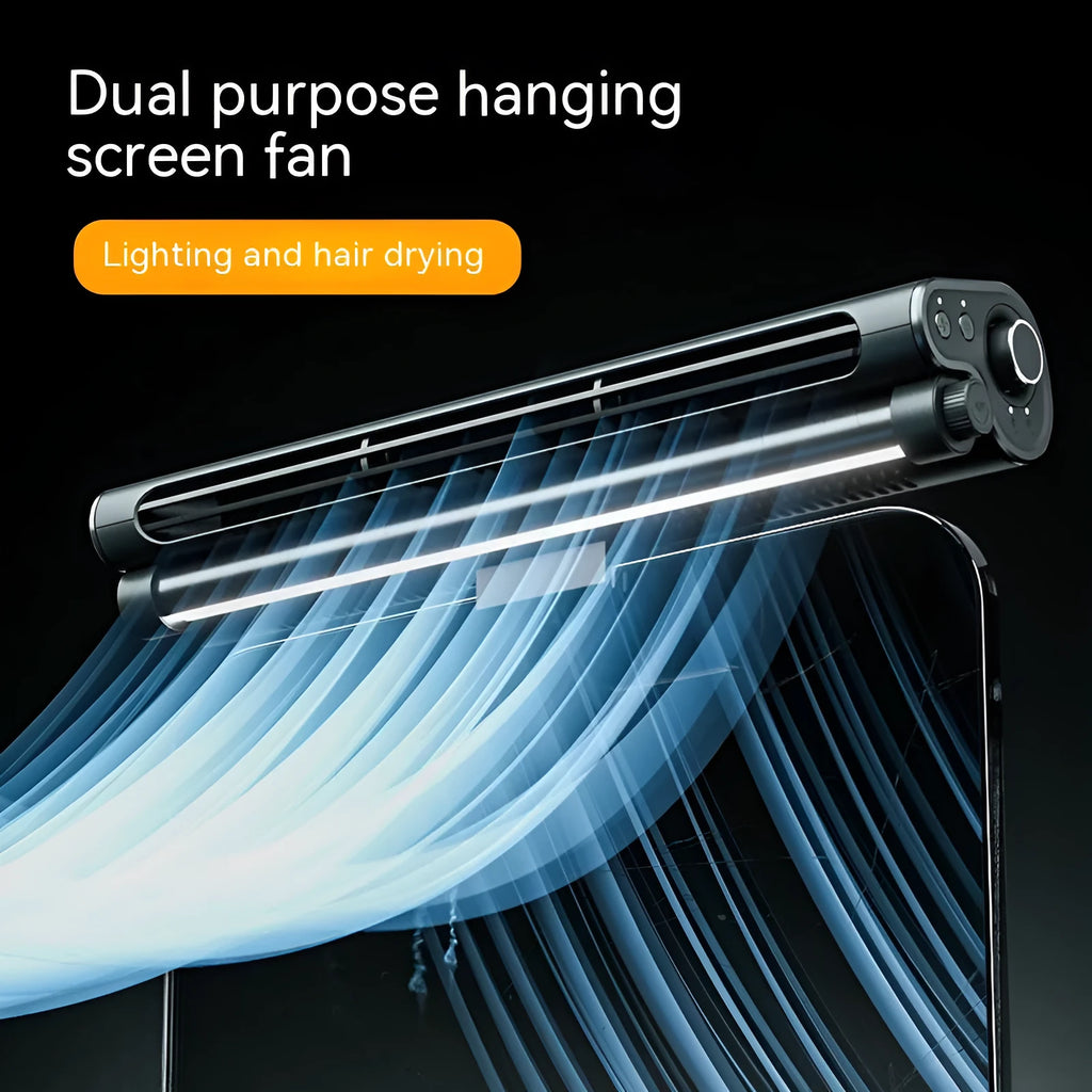 Black bladeless USB fan with light clipped to top of a laptop screen.
