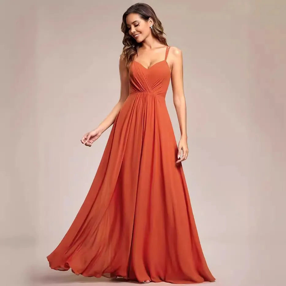 Women's light green sleeveless banquet dress with pleated A-line long skirt on a mannequin.