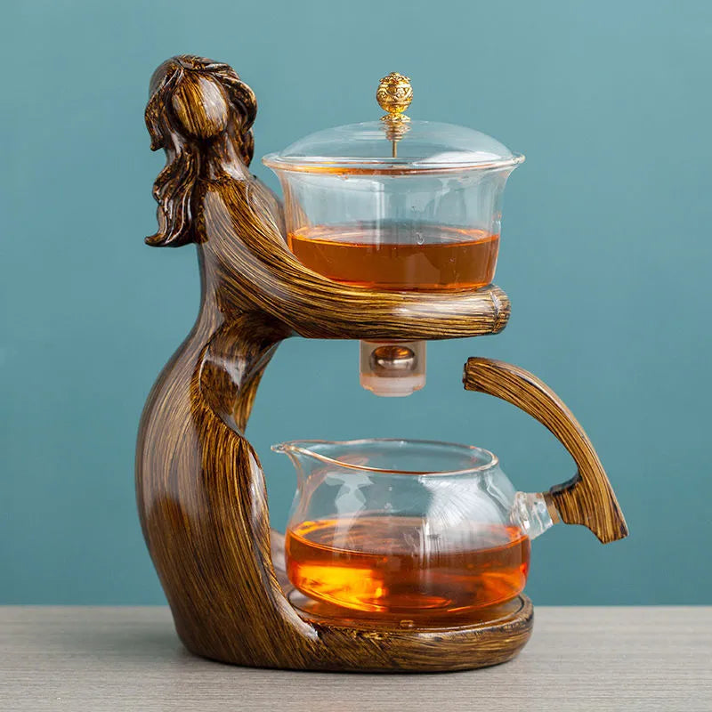 Maid semi-automatic tea set with borosilicate glass teapot, stainless steel filter, and Chinese-style woman sculpture base